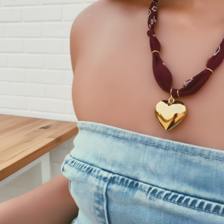 andmade bandana necklace featuring large golden heart pendant